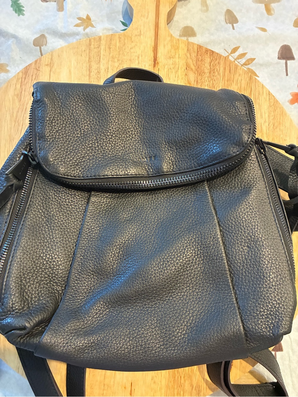Aimee Black pebble leather Backpack with strap for carrying